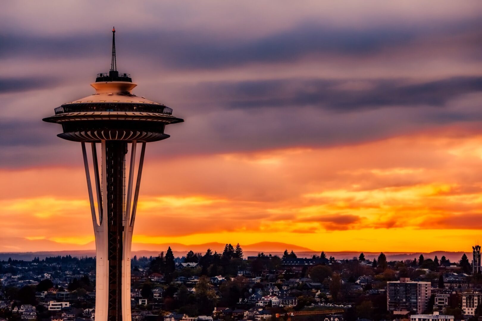 A view of the space needle at sunset.